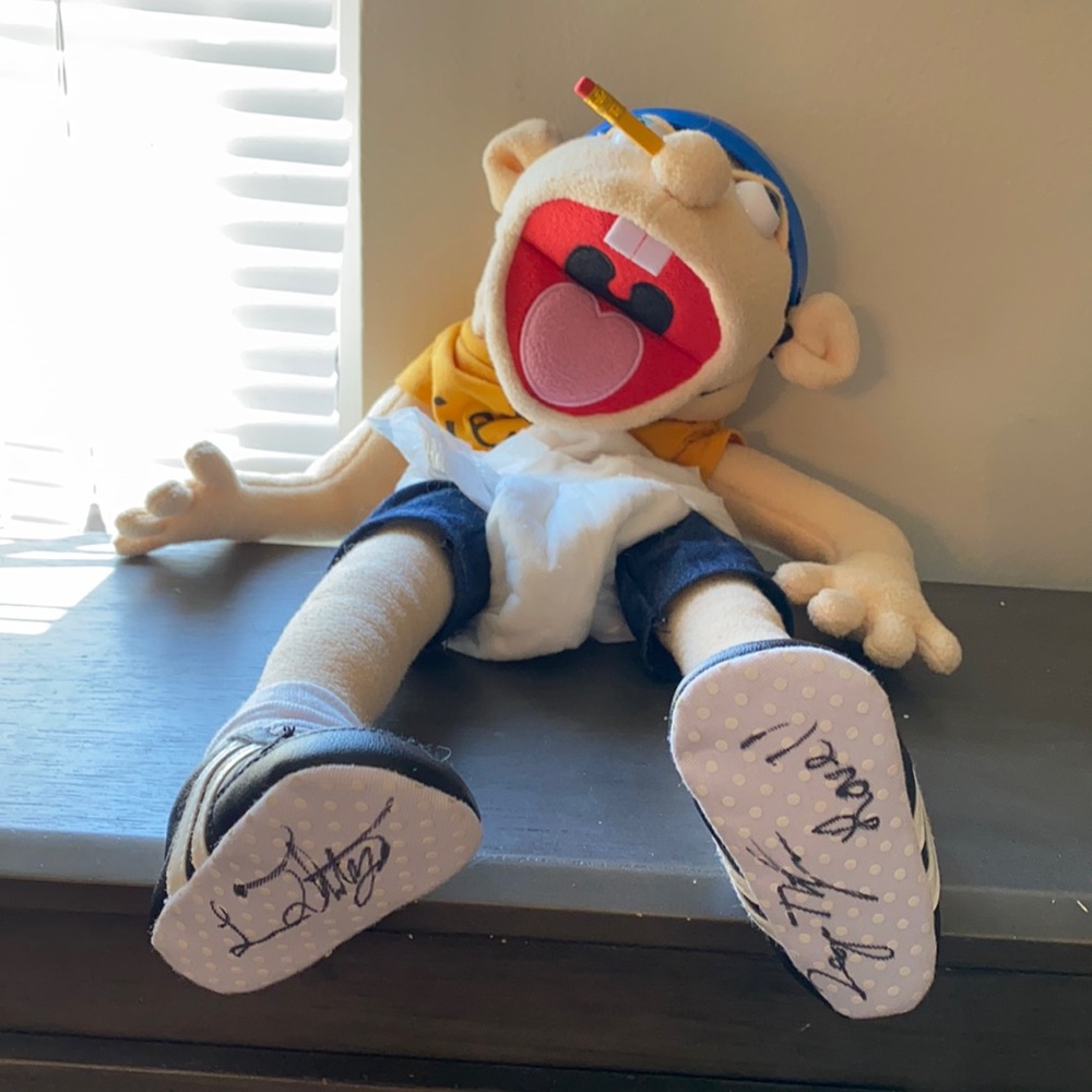 An signed SML Jeffy puppet signed by Logan Lovell and Lance